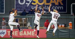 Twins outfielders celebrate another win