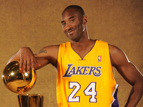 EL SEGUNDO, CA - SEPTEMBER 25:  Kobe Bryant #24 of the Los Angeles Lakers poses with the Larry OBrien trophy at Media Day at Toyota Sports Center on September 25, 2010 in El Segundo, California. NOTE TO USER: User expressly acknowledges and agrees that, by downloading and/or using this Photograph, user is consenting to the terms and conditions of the Getty Images License Agreement. Mandatory Copyright Notice: Copyright 2010 NBAE (Photo by Andrew D. Bernstein/NBAE via Getty Images) *** Local Caption *** Kobe Bryant