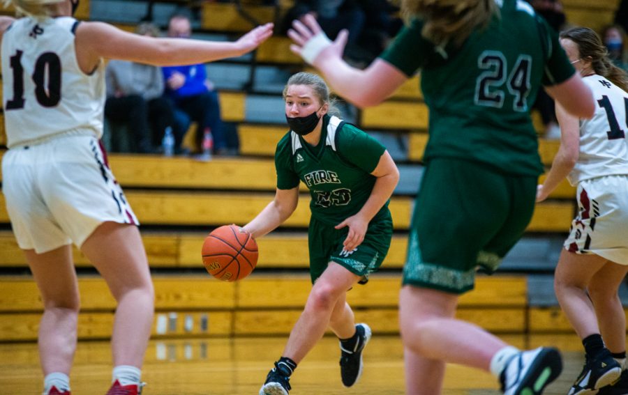 Holy Family’s Nicole Bowlin 22 (23) during a basketball game versus Orono. The Fire lost the game 77-55 on Tuesday, January 26, 2021 at Holy Family Catholic High School.