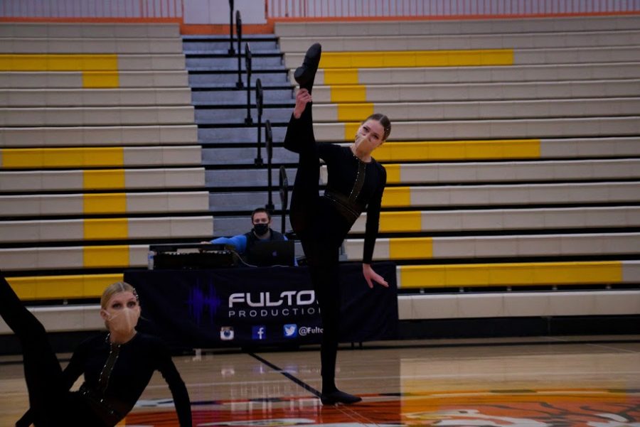 Holy Family Varsity Kick Dancers during a Tri-Meet at Delano High School. Arden Schlegel-The Phoenix
