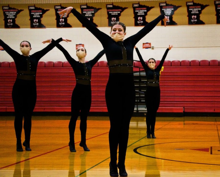 Holy Family Varsity Kick Dance Team during a competition at Cannon Falls High School. Arden Schlegel-The Phoenix